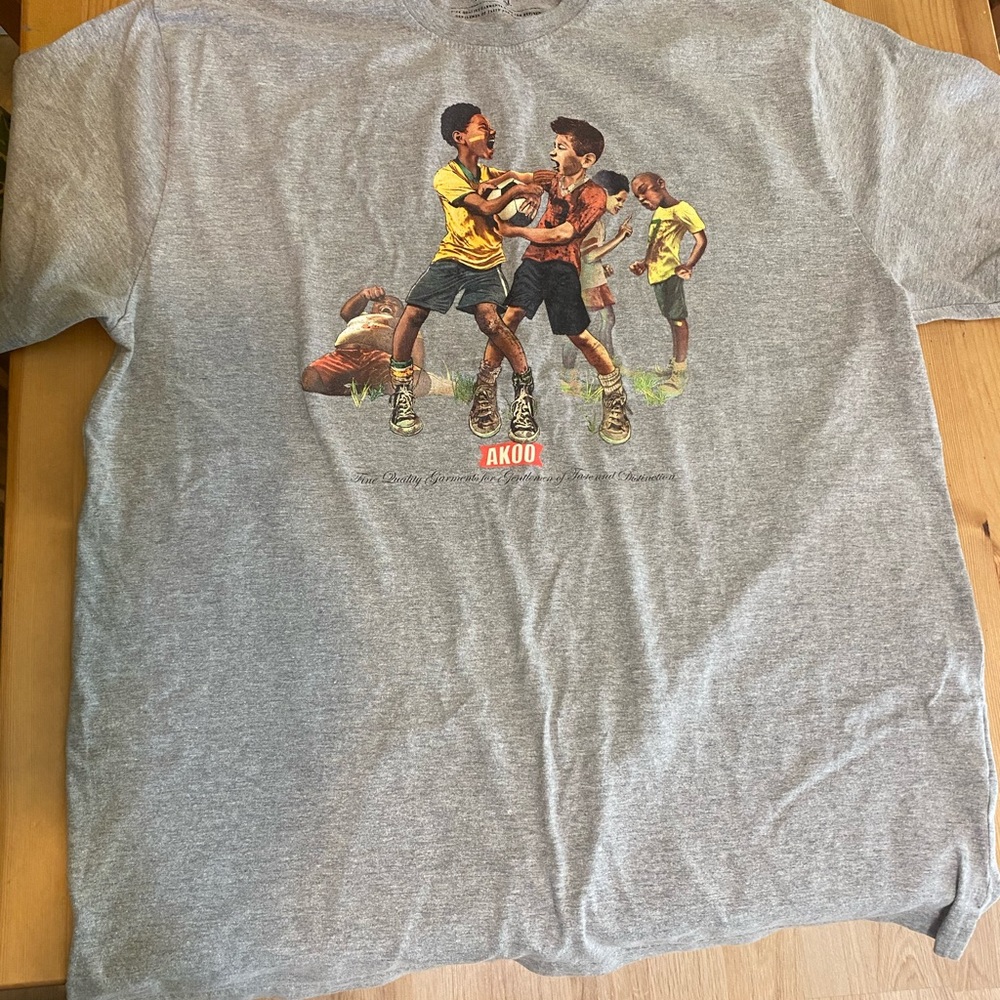 Akoo tshirt with kids arguing over a soccer game
